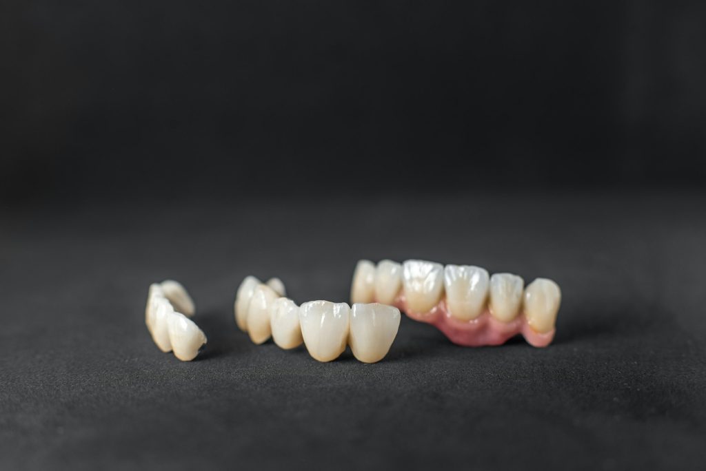 Dental crowns on the black background