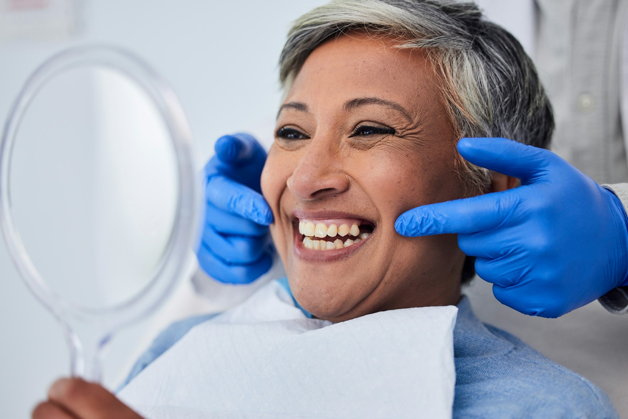 Senior woman, teeth and smile for dentist in dental care, appointment or checkup at the clinic. Hap