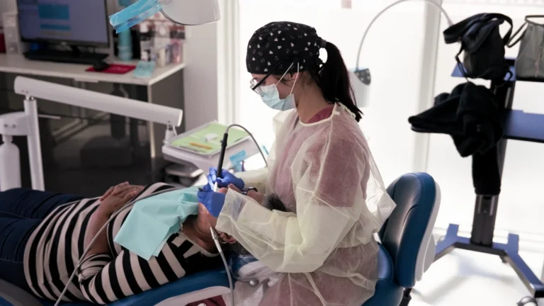 Dental cleaning in an operatory at Metropolitan Smile Design, Tamarac FL
