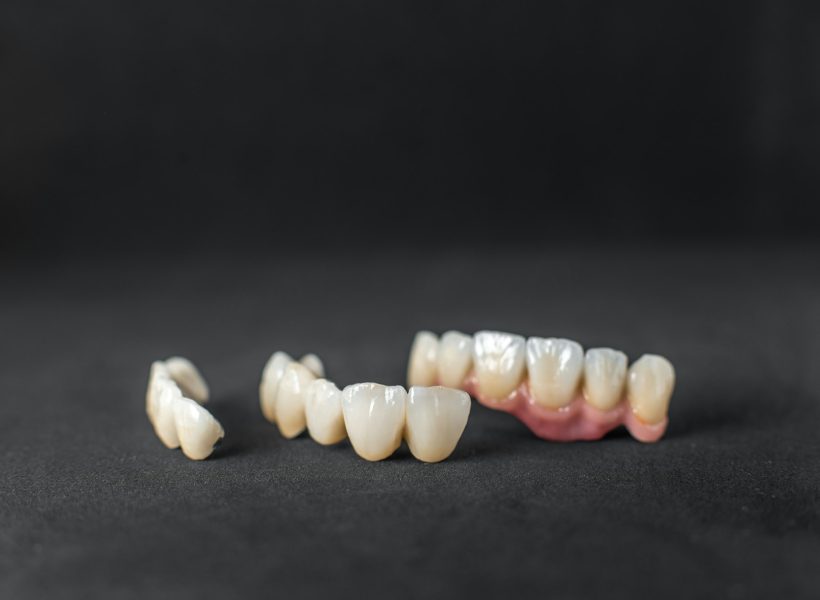 Dental crowns on the black background