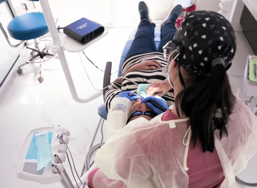 Overhead view of a dental cleaning at Metropolitan Smile Design, Tamarac FL