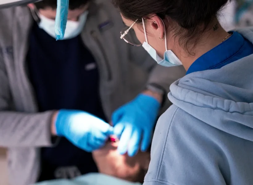 Dental team working together during treatment at Metropolitan Smile Design, Tamarac FL