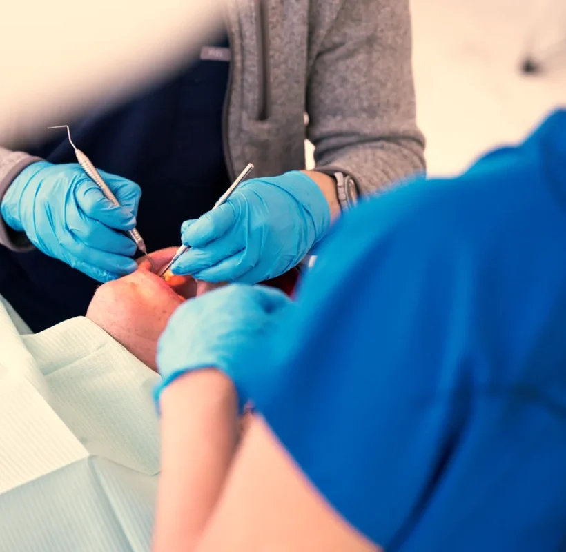 Dental team during a procedure at Metropolitan Smile Design, Tamarac FL