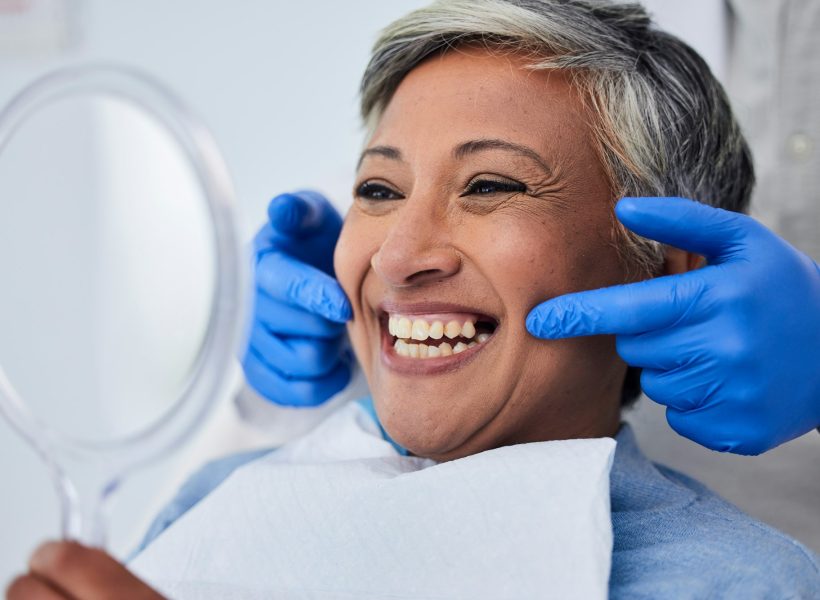 Senior woman, teeth and smile for dentist in dental care, appointment or checkup at the clinic. Hap